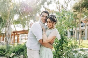 A heartfelt embrace between bride and groom captured by Indian Wedding Photographer in London In The Fable