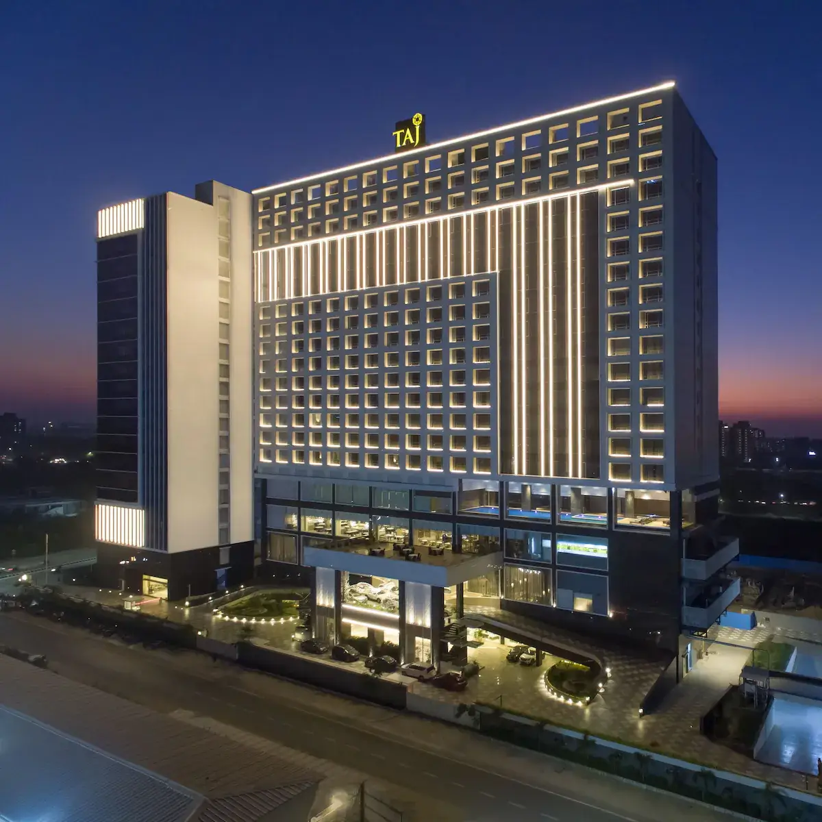 Taj Skyline Ahmedabad exterior at night – luxury wedding venue in Ahmedabad