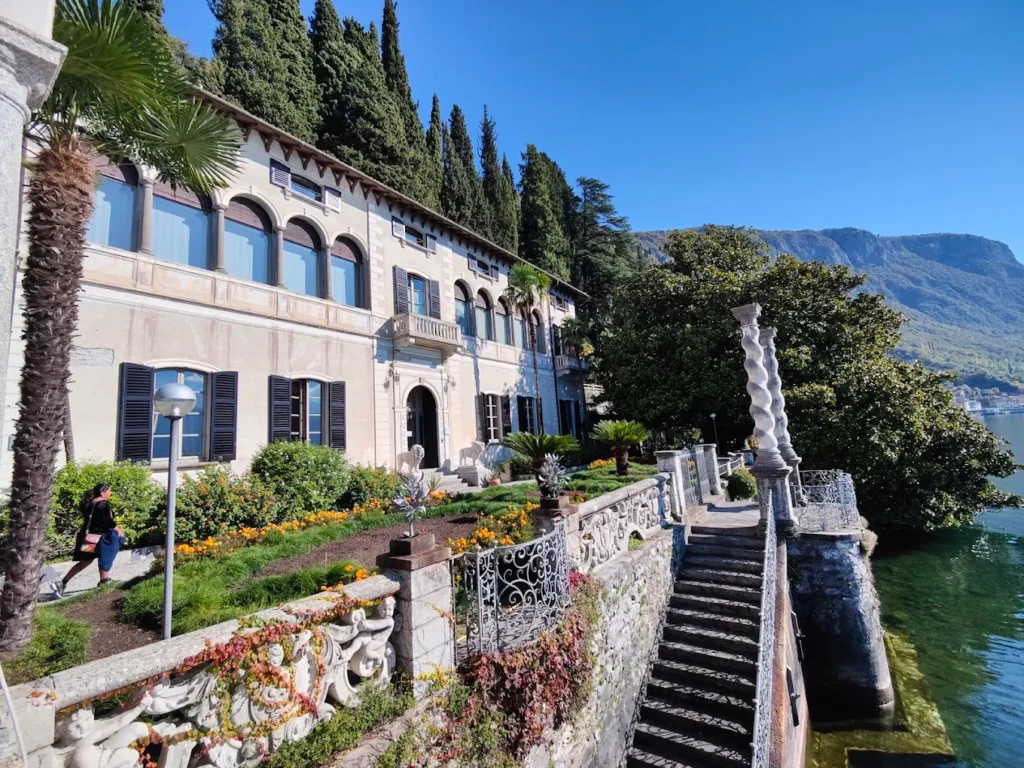Lake Como wedding photographer capturing Villa Monastero's botanical lakeside gardens, romantic walkways and historic colonnades.