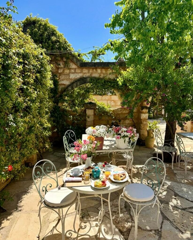 Wedding photographer Apulia capturing the bohemian gardens and antique details of Masseria Montenapoleone.