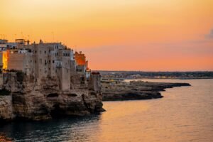 Sunset over the Adriatic coastline near wedding venues in Puglia Italy