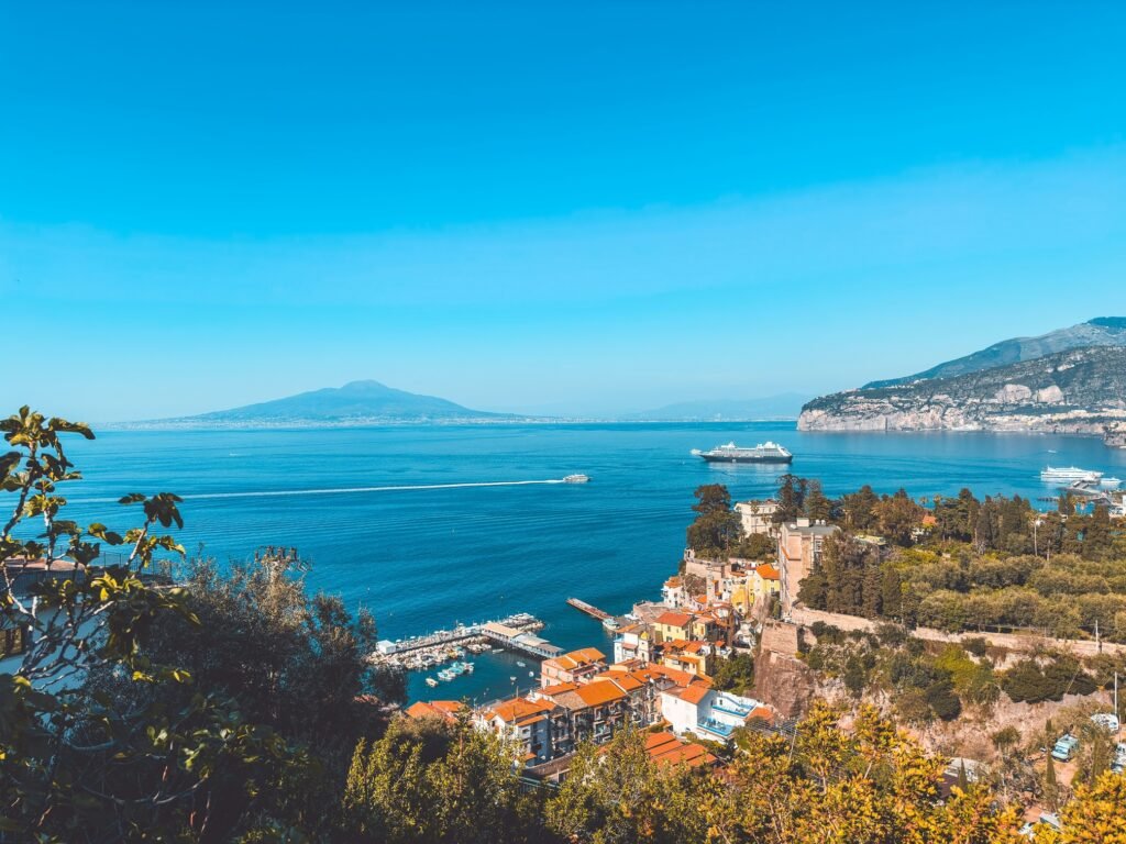 Sorrento coastline overlooking the Bay of Naples with Mount Vesuvius in the background.
