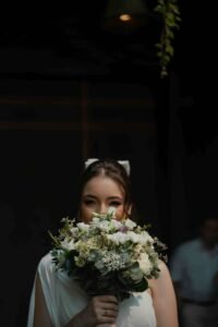 wedding photographer in Bangkok - Bride holding a bouquet for her wedding