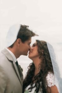 Wedding photographer in Koh Samui: Bride and groom by the beach at their pre-wedding photoshoot